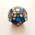 A rubik’s cube in the shape of a polyhedron. Illustrates learning should be difficult.