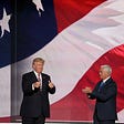 Donald Trump and Mike Pence clapping in front of a large American flag