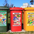 three bins for compost, waste and recycling.