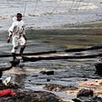Public Banned from Oil Spill Blackened Beach in Thailand