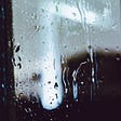 rain dripping down a window