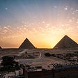 Egypt’s pyramids against a bright sky
