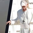 A gust of win blows Pope Francis' cape as he arrives at Dublin international airport , Ireland, Saturday, Aug. 25, 2018. Pope Francis is on a two-day visit to Ireland. (AP Photo/Greorio Borgia)