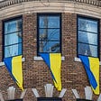 Ukrainian flags on the house in front of the Russian consulate