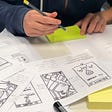 Image of mobile design sketches on a desk