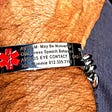 Photo of personalized Medical Alert bracelet that warns first responders that I’m autistic.