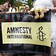 Amnesty International accuses Libya of abusing detained migrants