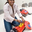 Dr. Ayanna Howard while she’s fixing the “SnoMote” robot.