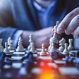 player making chess move