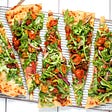 Rack of 5 big, veggie pizza slices that will grab eaters’ and menu readers’ attention.
