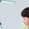 A child with a Dali Lamp, the latest innovation in edtech