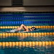 Photo of a swimmer by Jonathan Chng on Unsplash