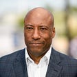 Byron Allen visits “Extra” at Universal Studios Hollywood on April 26, 2018, in Universal City, Calif.