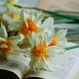 Flowers on open book