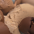 Close-up of scoops and swirls in different shades of brown; could be make-up, could be ice-cream.