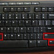 Computer Keyboard with some keys highlighted in red