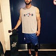 Daniel Norris holds a longboard in May 2015 in the Buffalo Bisons’ clubhouse.