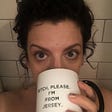 The author drinking from a mug that reads “BITCH, PLEASE. I’M FROM JERSEY.”