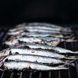 Grilled sardines an excellent oily fish and very good to eat if you’re having a hard time with your mental health
