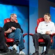 Bill Gates and Steve Jobs talking on Television.