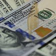 IMAGE: A closeup of a hundred dollars bill