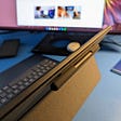 The back cover of the Lenovo Chromebook Duet 5 with its pen holder.