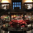 Inside the Francis Ford Coppola, Rustic Restaurant, showcasing a vintage red auto