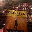 My Playbill and the set of Hamilton