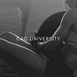 a woman doing a weighted sit-up with CAC University overlaid