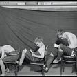 3 boys slouching on chairs to illustrate types of bad posture