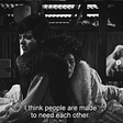 Screenshot of The Bitter Tears of Petra von Kant (1972) Rainer Werner Fassbinder. Two women dressed in furs lean against eat other, one appears to be sleeping. The subtitle reads: I think people are made to need each other.