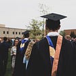 A College graduation ceremony. Photo by Charles DeLoye on Unsplash