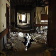 An abandoned, ruined hospital wing; in the foreground, a dancing Uncle Pennybags figure from the Monopoly game, he has removed his face, revealing a skull. Image: Nitram242 (modified) https://www.flickr.com/photos/25165196@N08/7082538687/ CC BY: https://creativecommons.org/licenses/by/2.0/