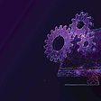 Illustration of gears coming out of desktop computer screen.