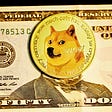 A physical Doge coin on top of a $50 bill, covering Ulysses S. Grant’s face.