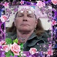 Photo of Kimberly Susan Fial, a transwoman murdered in San Jose. Photo is a profile shot with a flower filter