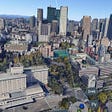 Google Earth VR inside a 360 view of Tokyo. Controller is showing with the Drag tooltip option in view.
