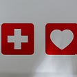 image of a heart and first aid symbol