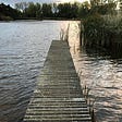 a picture of a jetty on a lake
