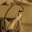 A lady with her VR headset.