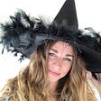 woman with long hair and witch hat