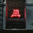 A neon sign saying “today was a good day”