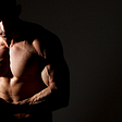 Shirtless man flexing muscles — 5 Ways To Flex Your Sexual Strengths