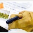 Subject tries to write and roll joint at same time