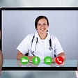 Doctor appears on tablet being held by a patient utilizing telehealth services