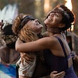 A scene from Yellowjackets in which Van (Liv Hewson) and Taissa (Jasmin Savoy Brown) embrace.