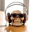 2020 was a rough year, but the music was amazing. Skeleton head with headphones on