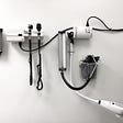 An image of a wall of medical instruments in a doctor’s office.