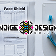 A packaging of a 3D-printed protective face shield shows the instructions of how to assemble while showing the IDC logo.