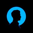 Blue and black silhouette of a man, facing right